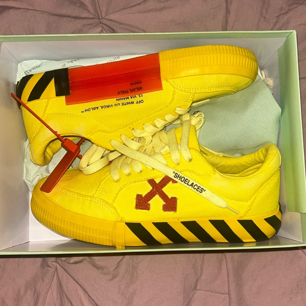 Off white yellow sneakers with red tag
